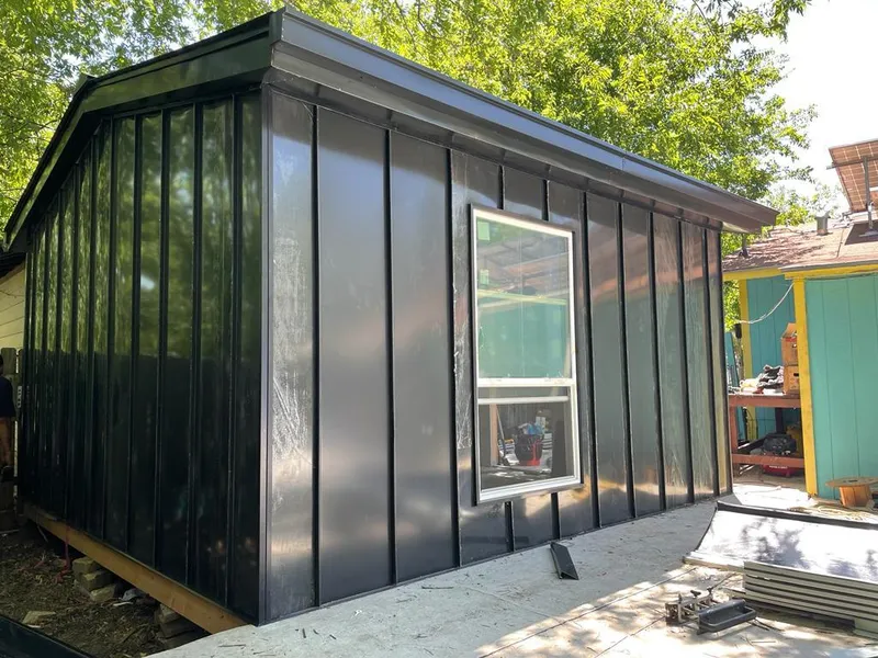 Black standing seam metal wall panels for Metal Roof Installation in Gentry